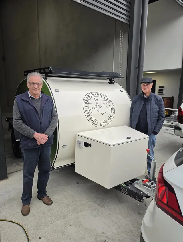 Geoff with their Breath Trailer at handover