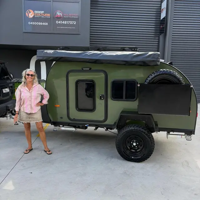 Suzanne with their Breath Trailer at handover