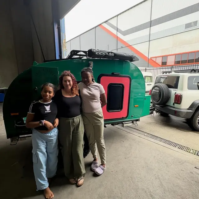Suzie with their Breath Trailer at handover