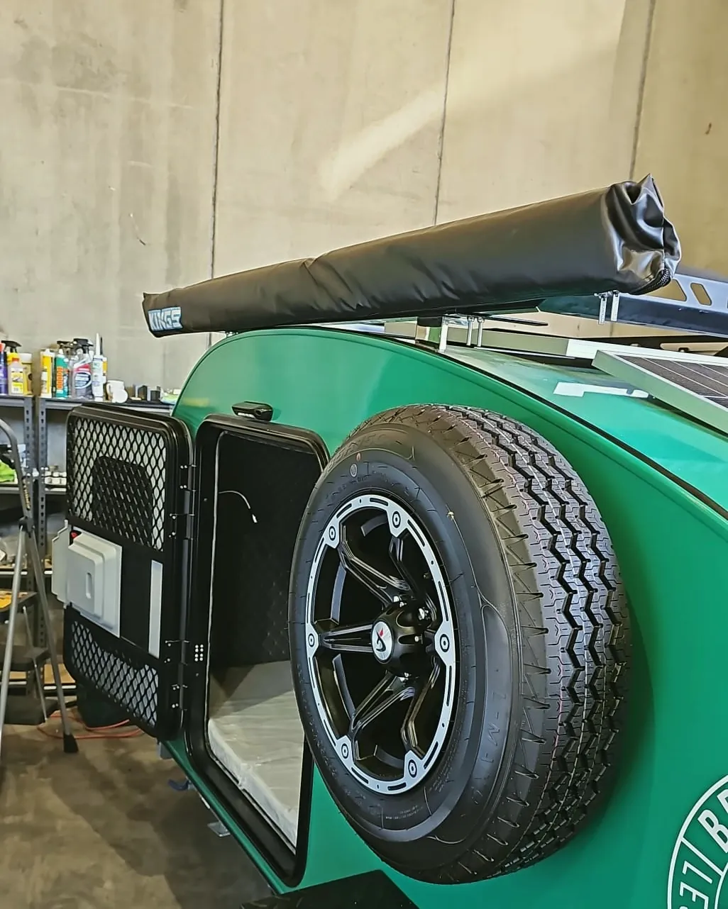 Spare wheel and awning on the Plus