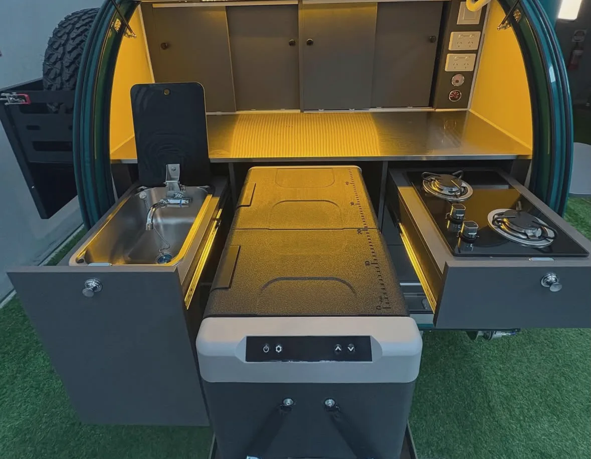 The Ultra rear kitchen: sink, slide-out fridge and two-burner stove