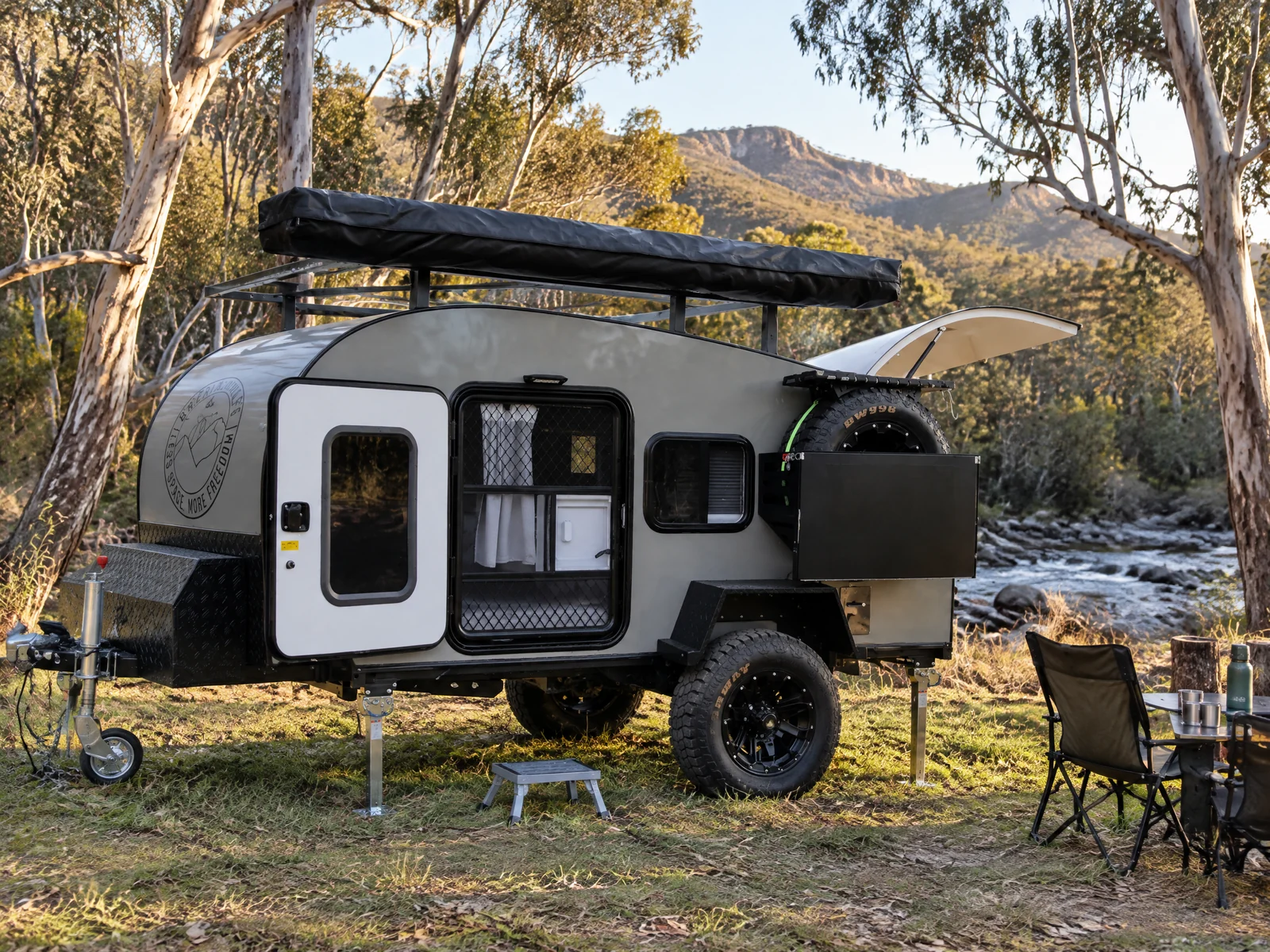 Breath Ultra at a silver snow gum campsite beside a clear alpine river at golden hour