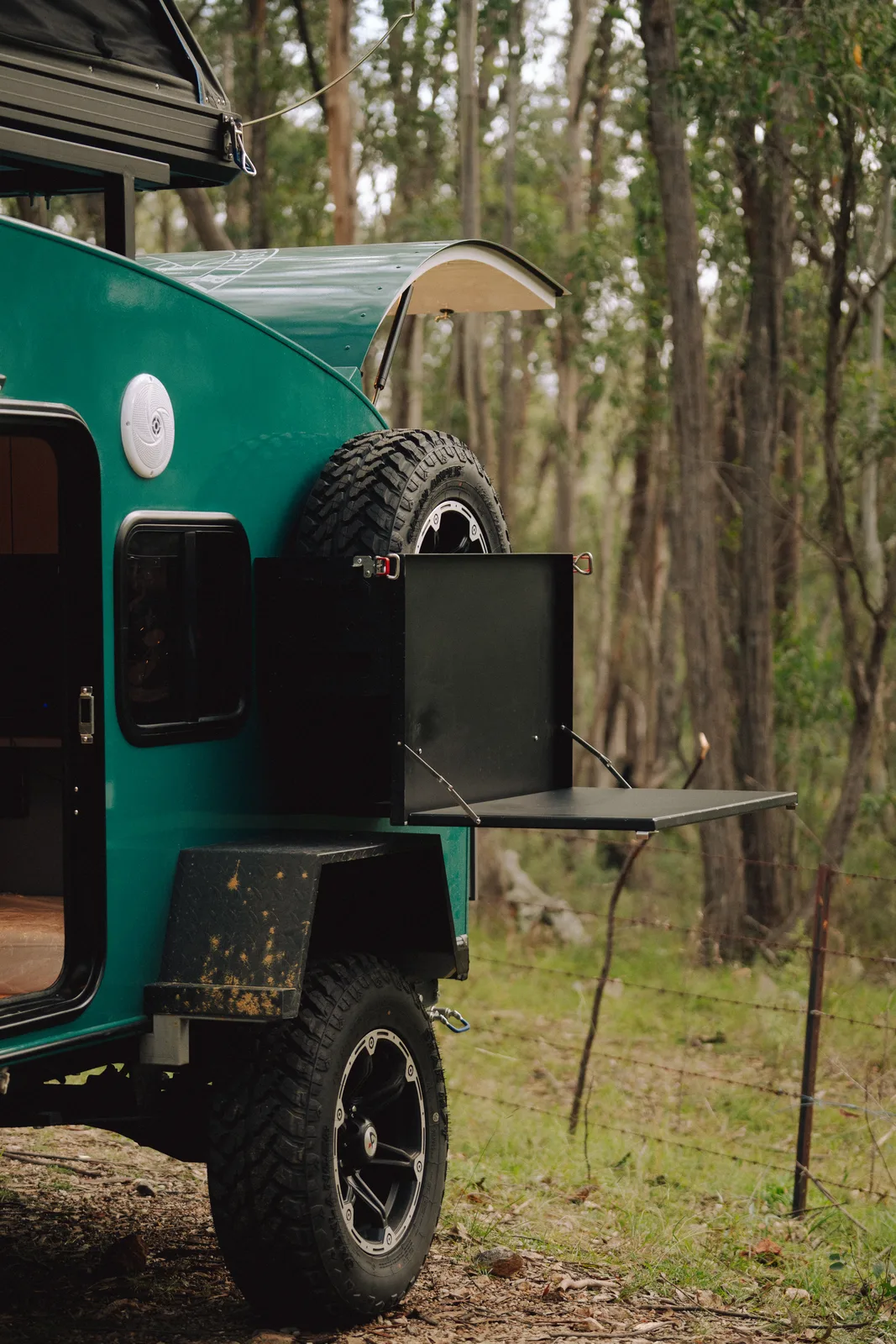 Breath Plus rear quarter detail with spare tire and side table