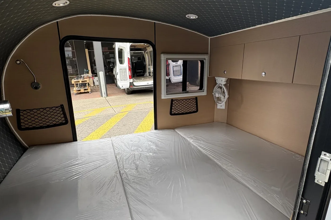 Breath Essential interior with queen mattress