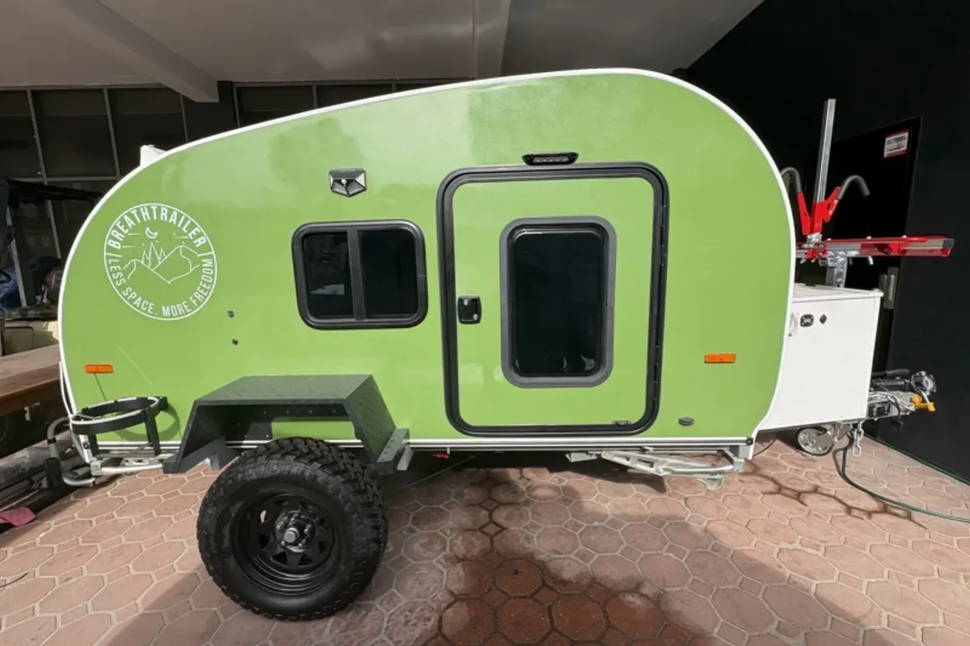 Breath Ultra teardrop camper in lime green, side view